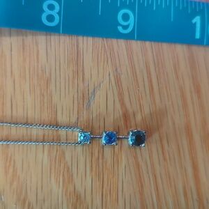 Single strand necklace with blue stones